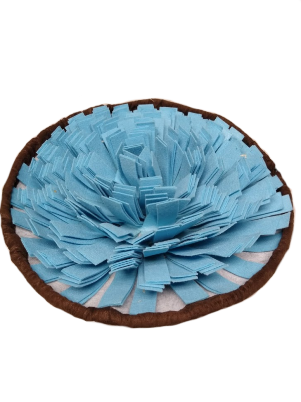 A round, blue snuffle mat.