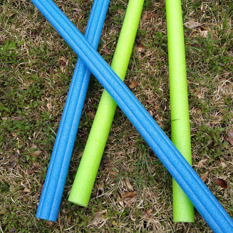 Four small pool noodles ready for use as horse enrichment.