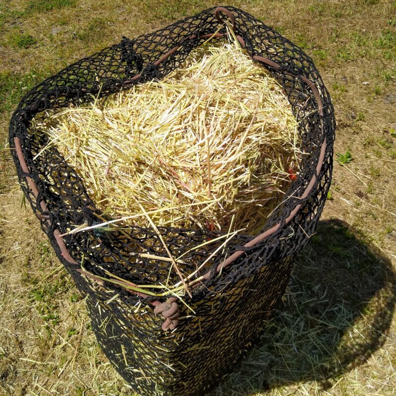 A hay net full of hay.