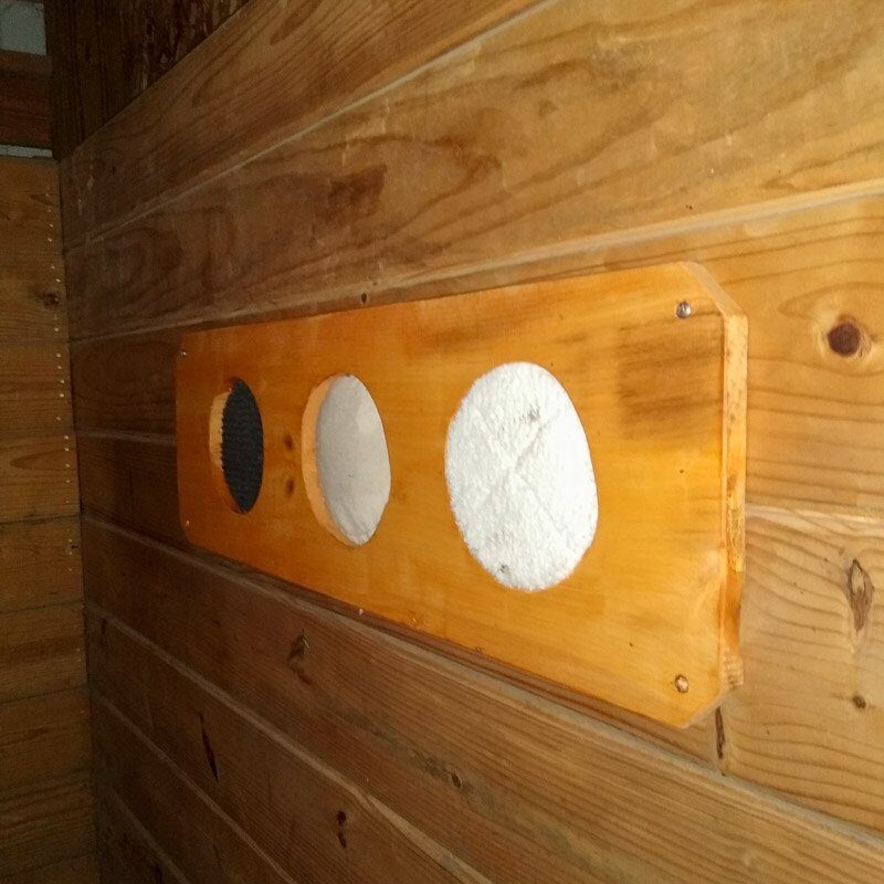 Sensory scent board in a horse stall