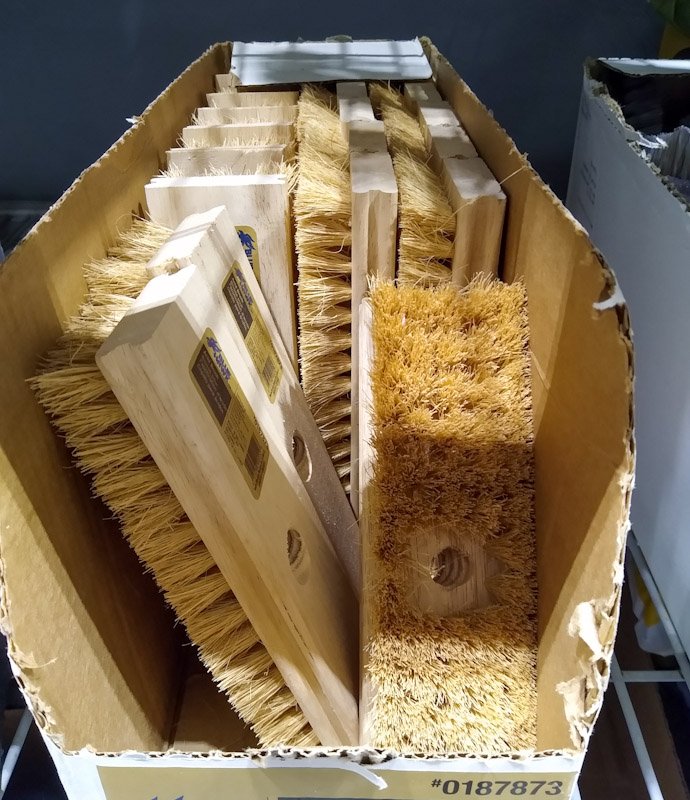 Box of wooden block natural bristle scrub brushes