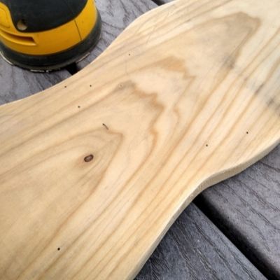 Close up of pine plank showing sanded edges.