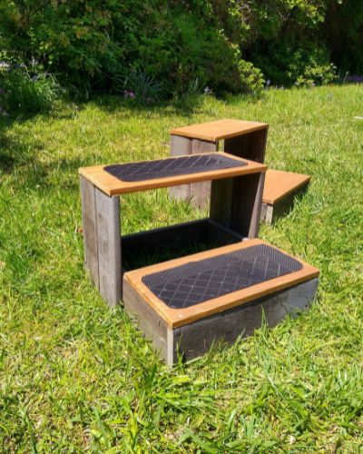 A DIY mounting block for horses with two steps that makes it easy for horses to stand at the mounting block